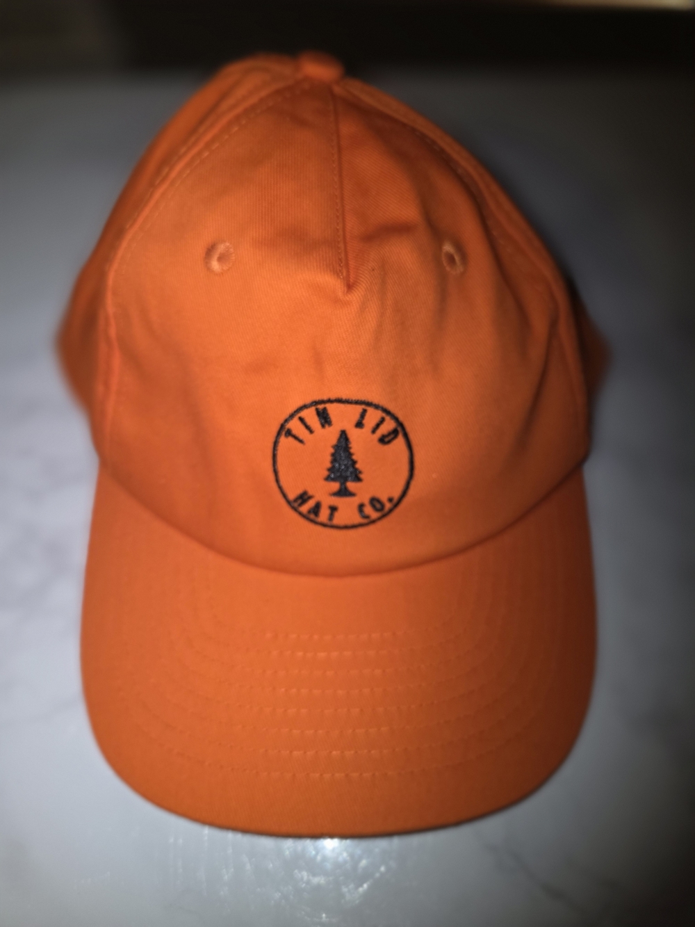 Tinlid Hat Co. orange adjustable snapback,